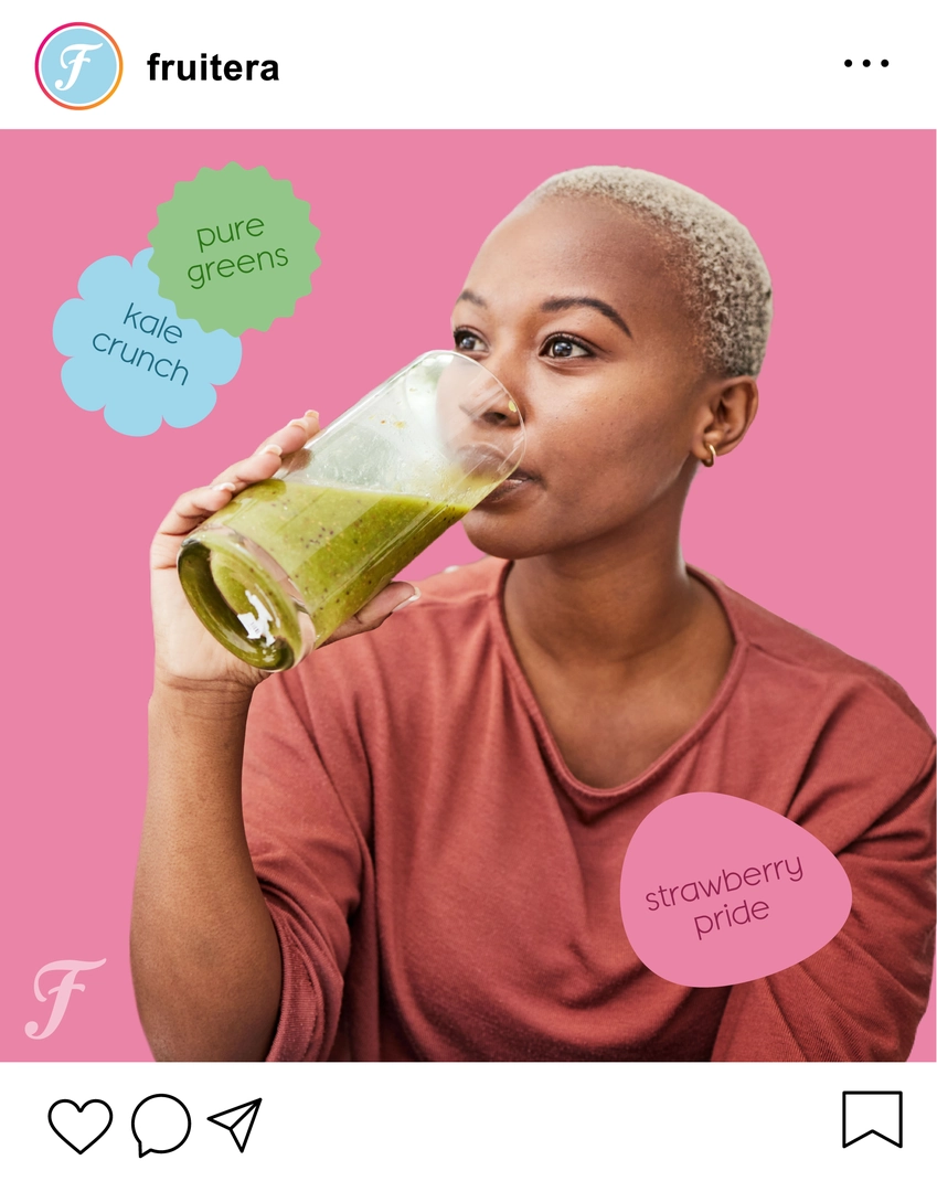 A woman enjoying a colorful smoothie, smiling as she takes a sip.