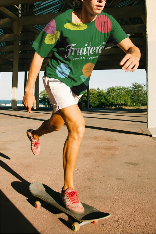 A man skillfully rides a skateboard across a parking lot, showcasing his balance and agility.